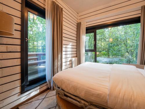 Ένα ή περισσότερα κρεβάτια σε δωμάτιο στο Antoing Escape near Forest