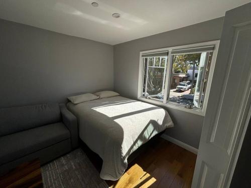Ένα ή περισσότερα κρεβάτια σε δωμάτιο στο Private Studio in Burlingables