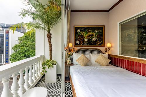 Katil atau katil-katil dalam bilik di White Lotus - Heritage Hotel