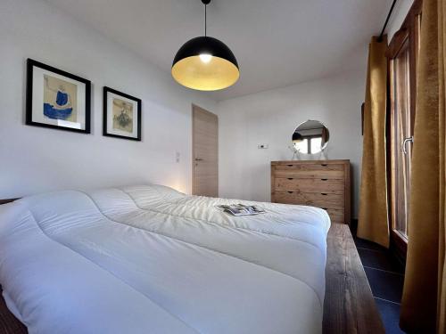 Postel nebo postele na pokoji v ubytování Appartement lumineux 2 chambres avec terrasse et garage privé à Briançon - FR-1-330C-144