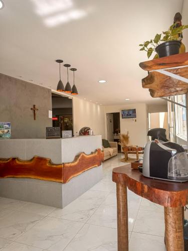 a lobby of a hospital with a counter at Pousada Costamar in Maragogi