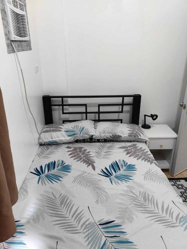 Postel nebo postele na pokoji v ubytování Phirst Batulao Staycation