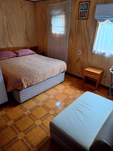 Postel nebo postele na pokoji v ubytování Natales trip