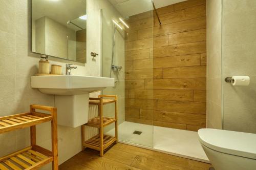 a bathroom with a sink and a shower at Isea & Sun Calaceite in Torrox Costa