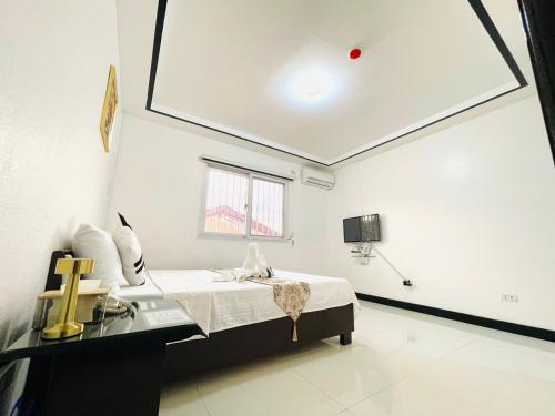 Ένα ή περισσότερα κρεβάτια σε δωμάτιο στο La Vita