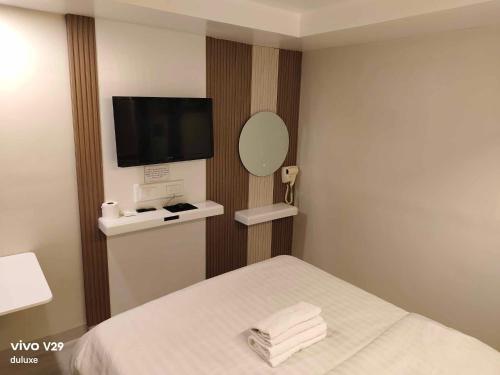 TV a/nebo společenská místnost v ubytování PARADISE HOTEL