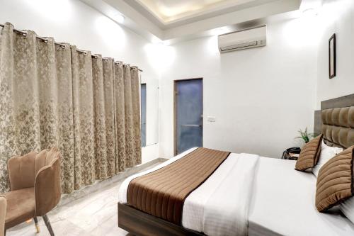 Letto o letti in una camera di Hotel Emporio Dx - New Delhi Railway Station - Paharganj