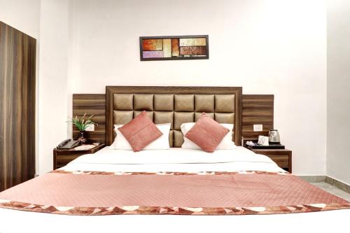 Letto o letti in una camera di Hotel Emporio Dx - New Delhi Railway Station - Paharganj