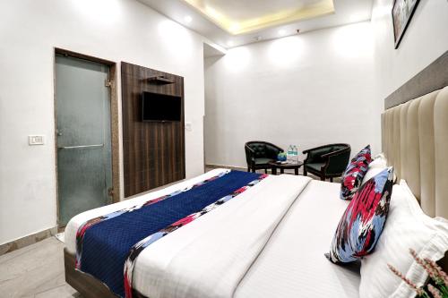 Letto o letti in una camera di Hotel Emporio Dx - New Delhi Railway Station - Paharganj