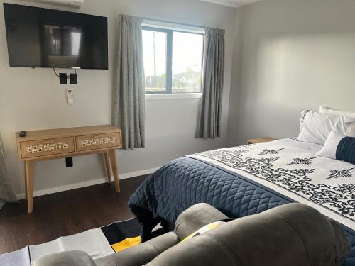 Postel nebo postele na pokoji v ubytování Windsor Motel