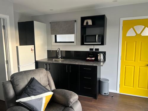 Kuchyň nebo kuchyňský kout v ubytování Windsor Motel
