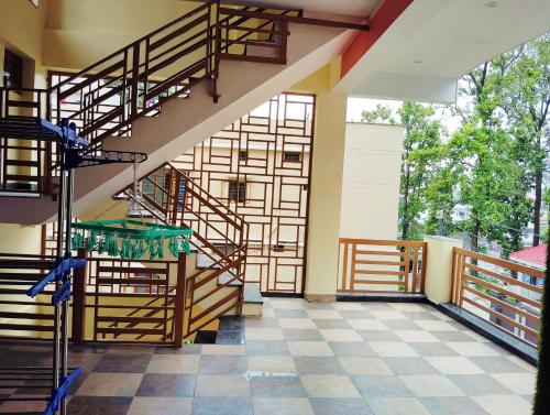 Φωτογραφία από το άλμπουμ του Doon Niwas Homestay Two- Bedroom 1st Floor- Mountain view, near main Picnic Spots, comfortable peaceful central Family-friendly σε Ντεχράντουν