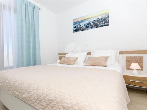 Ένα ή περισσότερα κρεβάτια σε δωμάτιο στο Villa LA-Two Bedroom Apartment with Terrace