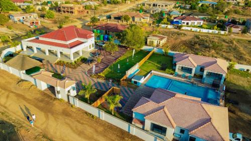 an aerial view of a house with a swimming pool at Mercy Boutique Hotel in Thohoyandou