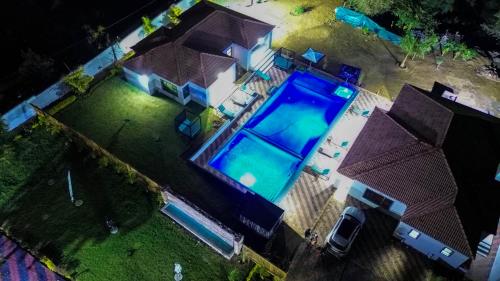 an overhead view of a house with a swimming pool at Mercy Boutique Hotel in Thohoyandou