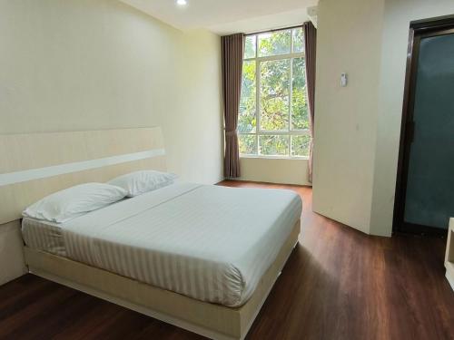 Katil atau katil-katil dalam bilik di Royal Kencana Hotel powered by Cocotel