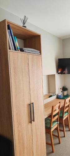 Hajlanderkaにあるテレビまたはエンターテインメントセンター
