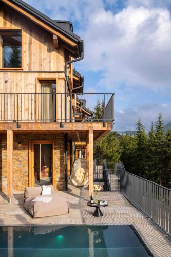 Bazén v ubytování Luxus AlmChalets Schladming-Dachstein nebo v jeho okolí