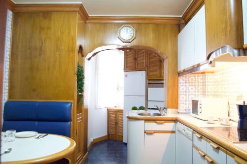 Kuchyň nebo kuchyňský kout v ubytování Apartamento ULTRAMAR