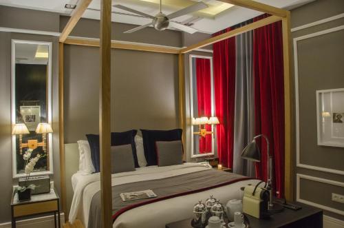 Katil atau katil-katil dalam bilik di Browns Central Hotel