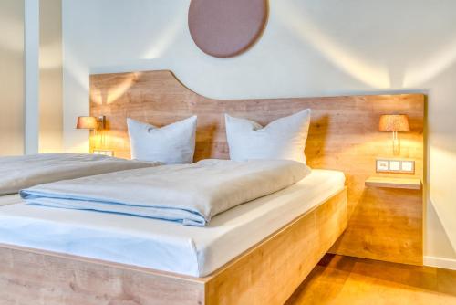 Postel nebo postele na pokoji v ubytování Guesthouse Beckmann