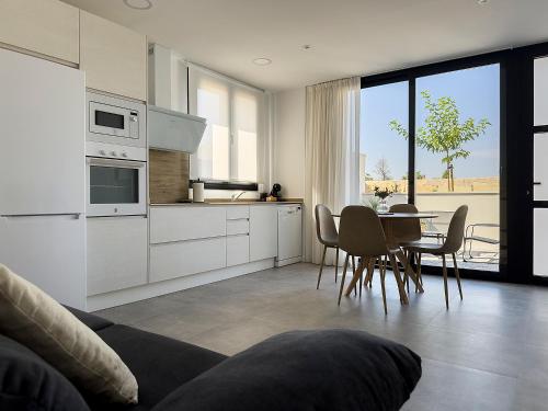 Kuchyň nebo kuchyňský kout v ubytování Apartamentos Clotilde
