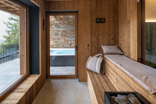 Postel nebo postele na pokoji v ubytování Luxus AlmChalets Schladming-Dachstein