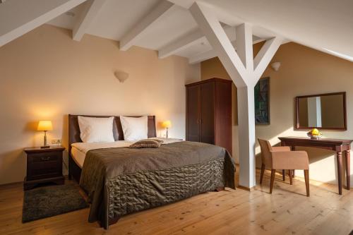 Postel nebo postele na pokoji v ubytování Mabre Residence