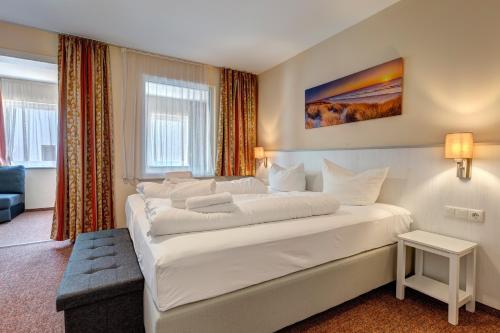 Voodi või voodid majutusasutuse Ferienhaus 7 Schlafzimmer UnserUsedom Ostseebad Koserow Insel Usedom toas