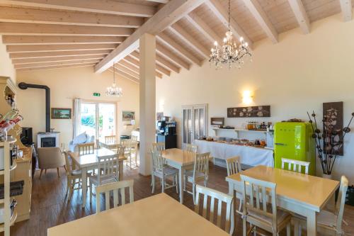 A restaurant or other place to eat at Agriturismo Colle Dei Pivi