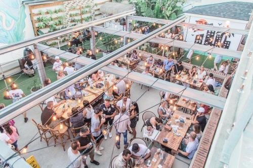 an overhead view of a restaurant with people sitting at tables at Luxury Beachside Apartment - The Hemingway in Gold Coast