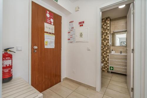 Postel nebo postele na pokoji v ubytování A Minha Casa na Praia da Rocha