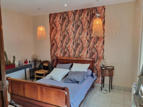 Ένα ή περισσότερα κρεβάτια σε δωμάτιο στο La Villa Marcelle