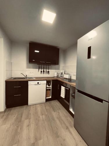 Kuchyň nebo kuchyňský kout v ubytování Ferienwohnung am Anger