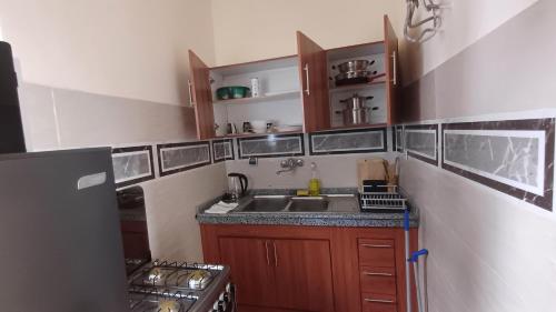 Una cocina o zona de cocina en Immeuble Bisrrah, Deux Pièces
