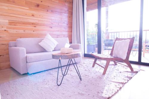 Posezení v ubytování Bio et Bois -Luxury Bio Farm-