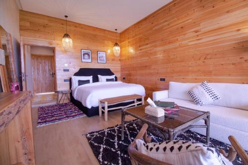 Postel nebo postele na pokoji v ubytování Bio et Bois -Luxury Bio Farm-
