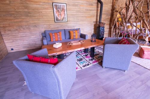 Posezení v ubytování Bio et Bois -Luxury Bio Farm-