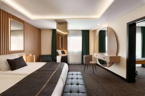 Letto o letti in una camera di FT Lotus Thermal Hotel&SPA Trademark Collection by Wyndham