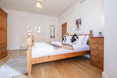 Katil atau katil-katil dalam bilik di Cosy Flat,Great Location&Parking