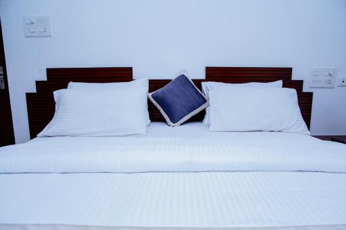 Hotel Swagathにあるベッド