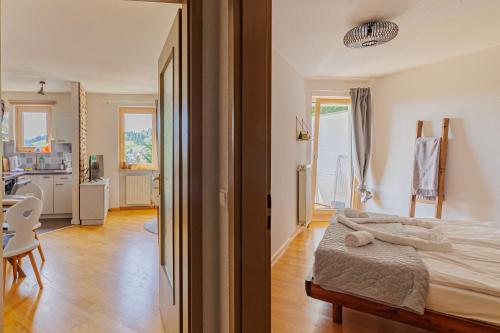 Postel nebo postele na pokoji v ubytování Zu Fuß zu Lift und Loipe mit Saunabereich und Traumblick