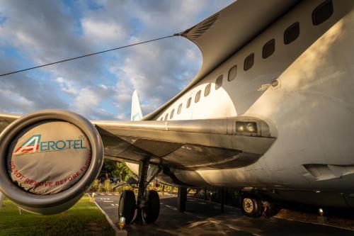an airplane is parked on a runway at Aerotel in Hoedspruit