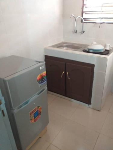 O bucătărie sau chicinetă la Les Residences EBAH