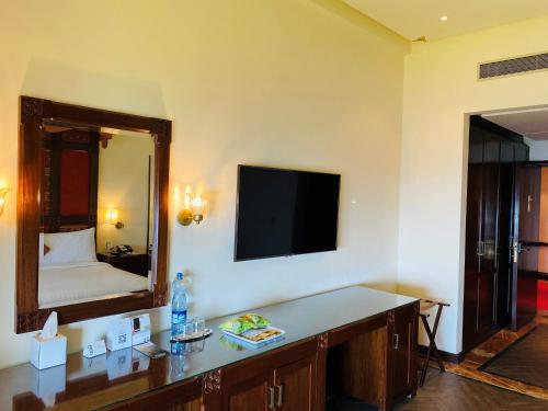 Ένα ή περισσότερα κρεβάτια σε δωμάτιο στο Pearl Continental Hotel Malam Jabba