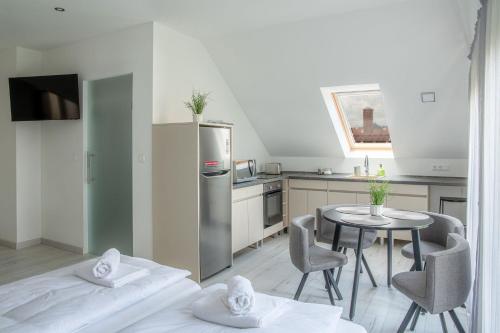 Kuchyň nebo kuchyňský kout v ubytování LOTUS Apartman Veszprém