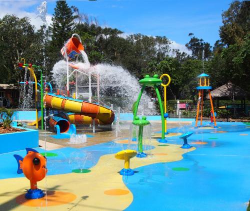 a large water park with a water slide at Discovery Parks - Emerald Beach in Emerald Beach