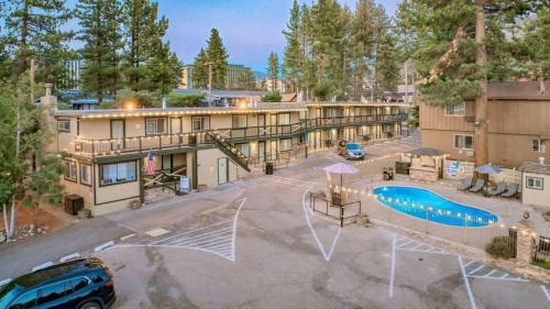 an aerial view of a building with a swimming pool at Moose and Maple Lodge in South Lake Tahoe