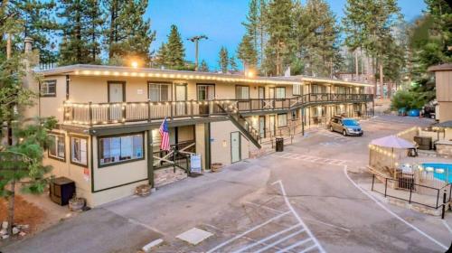 an aerial view of a building with a parking lot at Moose and Maple Lodge in South Lake Tahoe