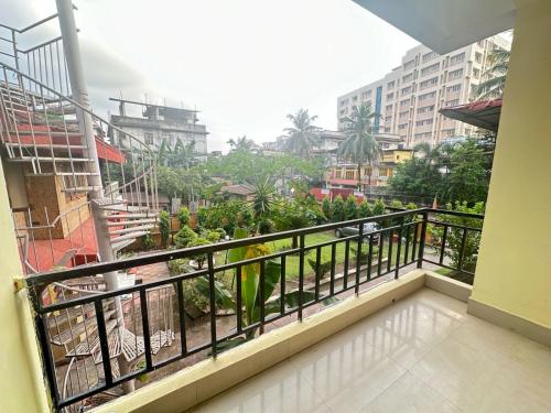 a balcony with a view of a city at Dreams Abode Homestay in Guwahati